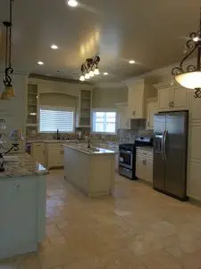 Elegant kitchen renovation with granite countertops and stainless steel appliances