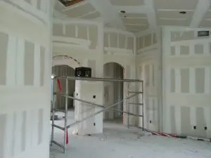 Complete end-to-end drywall installation process performed by the construction team